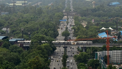 An aerial view of a Delhi Metro train running on a track over the Ring Road. (PTI Photo) An aerial view of a Delhi Metro train running on a track over the Ring Road. (PTI Photo)