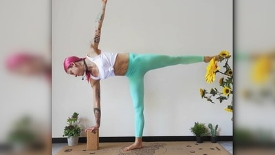 Ardha chandrasana or half-moon pose: Start with a Triangle Pose putting your left leg forward, gently bend your right knee and bring your left hand to your hip. Form an arch like a half-moon.  (Instagram/@yoga_valentinalucchini)
