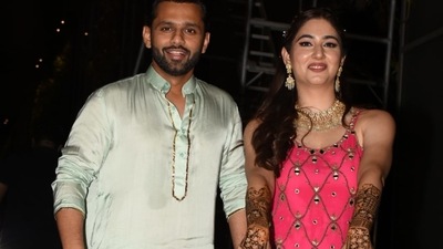 Rahul Vaidya and Disha Parmar pose for paparazzi at their mehendi ceremony. (Varinder Chawla) Rahul Vaidya and Disha Parmar pose for paparazzi at their mehendi ceremony. (Varinder Chawla)