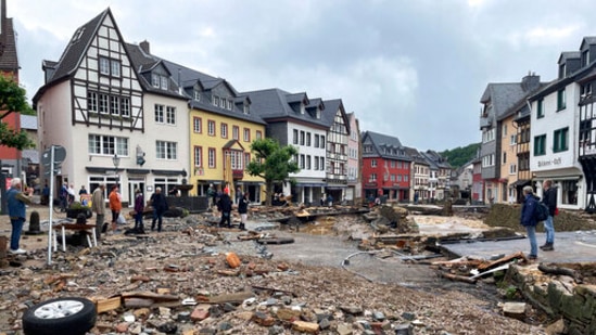 Many more missing as buildings give way amid heavy rain and once-in-a-generation flooding.(AP)