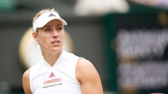 FILE PHOTO: Jul 8, 2021; London, United Kingdom; Angelique Kerber (GER) seen on court playing Ashleigh Barty (AUS) in the womenÕs singles quarter final match at All England Lawn Tennis and Croquet Club. Mandatory Credit: Peter van den Berg-USA TODAY Sports(USA TODAY Sports)