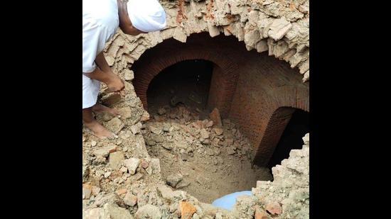The tunnel-like structures made of small bricks — that were reportedly used centuries ago — were found at a depth of about 25 feet. (HT Photo) The tunnel-like structures made of small bricks — that were reportedly used centuries ago — were found at a depth of about 25 feet. (HT Photo)