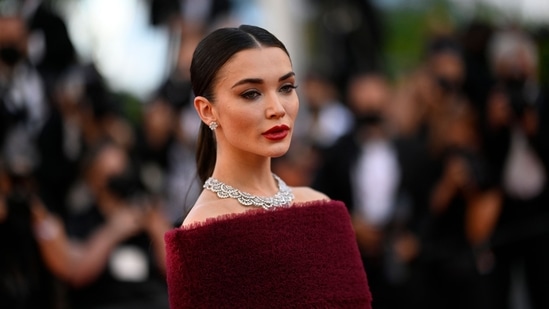 British actress and model Amy Jackson arrives for the screening of the film "A Felesegem Tortenete" (The Story Of My Wife) at the 74th edition of the Cannes Film Festival in Cannes, southern France, on July 14, 2021. (AFP)