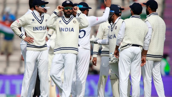 India's captain Virat Kohli, second left, and teammates celebrate(AP)