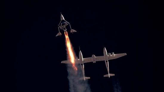 Virgin Galactic's passenger rocket plane VSS Unity, carrying Richard Branson and crew, begins its ascent to the edge of space above Spaceport America near Truth or Consequences, New Mexico, US, on July 11, 2021. (via REUTERS)