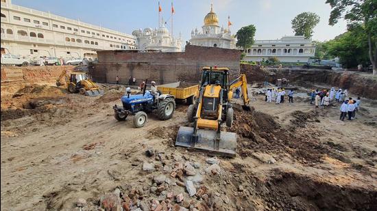 The structures were excavated while digging the soil for building a new jora ghar at the Golden Temple Complex in Amritsar. (HT Photo)