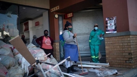 South Africa’s Covid-19 vaccination program has been disrupted by the unrest with the government halting inoculations in the southeastern province of KwaZulu-Natal and parts of Gauteng, the country’s commercial hub. (AP)