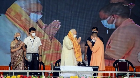 Prime Minister Narendra Modi, UP Chief Minister Yogi Adityanath and state Governor Anandiben Patel during the inauguration of various developmental projects, at BHU Ground in Varanasi.(PTI)