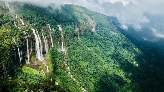 Shillong, Meghalaya: Also known as the "Scotland of the East," Shillong is a hill station located in the East Khasi Hills district of Meghalaya. The nearest airport is Umroi Airport and the distance from Umroi Airport to Shillong city is 57 minutes.(Unsplash)
