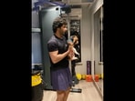 The image taken from video shows Varun Dhawan with his dog.