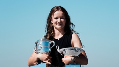 Czech Republic's Barbora Krejcikova holds the French Open tennis tournament women's cup, left, and women's doubles cup during a photocall. (AP)