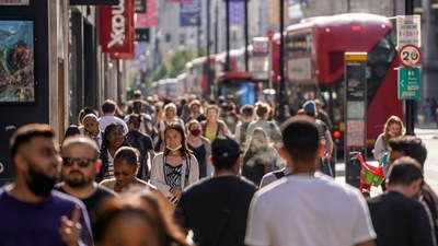 From Monday -- dubbed "Freedom Day" by some media -- the government will lift most restrictions on public gatherings in England and allow businesses such as nightclubs to reopen. In picture - Pedestrians on Oxford Street in central London. (AFP) From Monday -- dubbed "Freedom Day" by some media -- the government will lift most restrictions on public gatherings in England and allow businesses such as nightclubs to reopen. In picture - Pedestrians on Oxford Street in central London. (AFP)