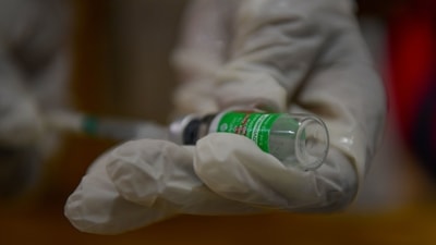 The Union ministry of health and family welfare on Friday said that more than 25 million vaccine doses are remaining unutilised with the states. (AFP) The Union ministry of health and family welfare on Friday said that more than 25 million vaccine doses are remaining unutilised with the states. (AFP)