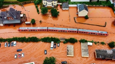 A train is seen stranded at a station in the town of Kordel, flooded by the rising waters of the Kyll river, in western Germany. (AFP) A train is seen stranded at a station in the town of Kordel, flooded by the rising waters of the Kyll river, in western Germany. (AFP)