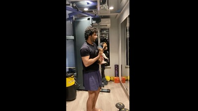 The image taken from video shows Varun Dhawan with his dog. (Instagram/@varundvn)