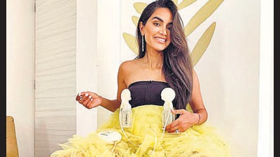 Influencer Diipa Khosla added breast pumps to her strapless Cannes outfit to raise awareness. (Photo: Instagram/Diipa Büller-Khosla)