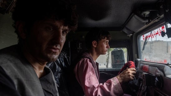 Ahmad Shah, 28, an Afghan policeman, sits in an police armoured vehicle after being rescued by Afghan Special Forces, in Kandahar province, Afghanistan on July 13. Siddiqui’s recent reports included graphic images of vehicles of the Afghan forces being targeted with rockets, and he had tweeted a brief video of the armoured Humvee vehicle he was in being hit by a rocket.(Danish Siddiqui / REUTERS)