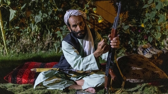 A militiaman loads his rifle as Afghan Special Forces visit a district centre during a combat mission against Taliban, in Kandahar province, Afghanistan on July 12.(Danish Siddiqui / REUTERS)