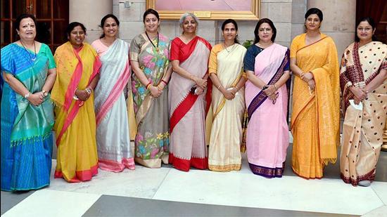 Union minister of finance Nirmala Sitharaman and union minister for women & child development Smriti Irani along with newly appointed women Cabinet ministers in New Delhi. (ANI)