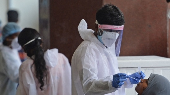 Even though the daily infections in India are seeing a slight increase amid the ongoing second wave of the pandemic, the arrival of the third wave in the country is inevitable.(AFP file photo) Even though the daily infections in India are seeing a slight increase amid the ongoing second wave of the pandemic, the arrival of the third wave in the country is inevitable.(AFP file photo)