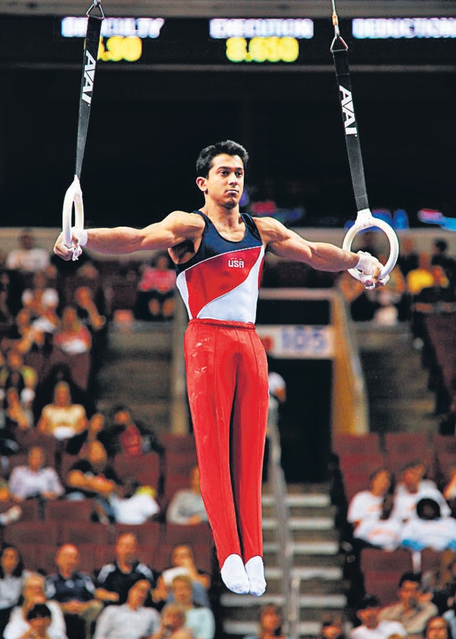 American gymnast Raj Bhavsar has two moves named after him, on the parallel bars and the still rings. (Image courtesy RajBhavsar.com) American gymnast Raj Bhavsar has two moves named after him, on the parallel bars and the still rings. (Image courtesy RajBhavsar.com)