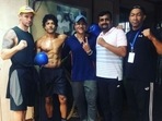 Farhan Akhtar shared a picture with the four men responsible for his boxer's look in Toofaan. Farhan Akhtar shared a picture with the four men responsible for his boxer's look in Toofaan.