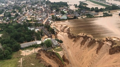 An aerial view of the flooded town of Erftstadt, Germany following heavy rains on July 16. With the death toll in Germany at 133 three days into the disaster, rescuers say far more bodies are likely to be found in sodden cellars and collapsed homes as the clean-up gets under way in earnest. (Bezirksregierung Köln / AFP)