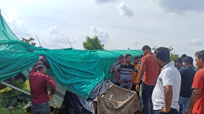 People gather at the crash site