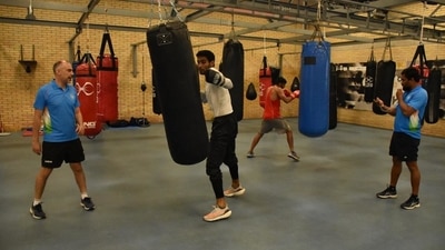 Coaches look on as Indian boxers sweat it out on the final day of training in Assisi, Italy, ahead of their departure for the Tokyo Olympics. (SAI) Coaches look on as Indian boxers sweat it out on the final day of training in Assisi, Italy, ahead of their departure for the Tokyo Olympics. (SAI)
