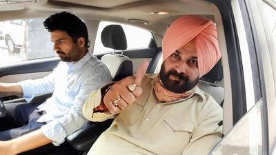 Navjot Singh Sidhu leaves for Amritsar from his residence in Patiala on Saturday. (PTI photo)