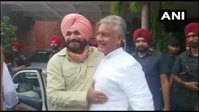 Former minister Navjot Singh Sidhu, who is set to become the Punjab Congress chief, calling on incumbent Sunil Jakhar at his residence in Panchkula near Chandigarh on Saturday. (ANI Photo) Former minister Navjot Singh Sidhu, who is set to become the Punjab Congress chief, calling on incumbent Sunil Jakhar at his residence in Panchkula near Chandigarh on Saturday. (ANI Photo)