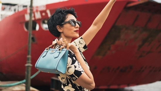 Photos: Sobhita Dhulipala poses for Gucci in pixie 7 To this, Sobhita added a light blue leather Gucci Dyna Mini Tote Bag, which according to the website has the signature bamboo handle and double G hardware, which is accentuated by two neon bands. (Instagram)