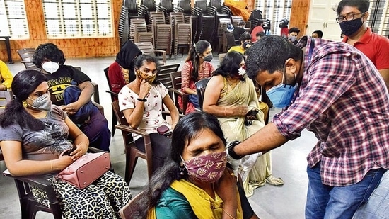 A beneficiary is administered a vaccine dose in Kochi. (ANI) A beneficiary is administered a vaccine dose in Kochi. (ANI)