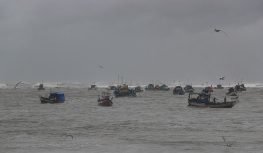 Fishermen try to return to the shores on the Arabian Sea coast in Mumbai. (AP Photo) Fishermen try to return to the shores on the Arabian Sea coast in Mumbai. (AP Photo)