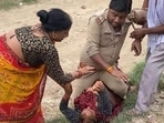 Sub-inspector Mahendra Patel allegedly got into a fight with Arti Yadav, with the latter claiming that Patel dragged her down and beat her up by sitting atop her. Sub-inspector Mahendra Patel allegedly got into a fight with Arti Yadav, with the latter claiming that Patel dragged her down and beat her up by sitting atop her.