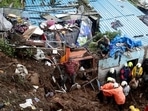 Prime minister Narendra Modi announced ex-gratia of <span class='webrupee'>?</span>200,000 each for the families of those who were killed and <span class='webrupee'>?</span>50,000 for those injured. Maharashtra minister Aaditya Thackeray on Sunday visited the sites of landslides in Mumbai and said that the state government and the Brihanmumbai Municipal Corporation (BMC) are providing all necessary financial and medical assistance to those affected.(AP Photo/Rajanish Kakade)