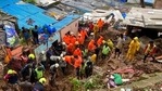 Rescuers look for survivors after a wall collapsed on several slum houses heavy monsoon rains in the Mahul area of Mumbai, India, Sunday, July 18, 2021. More than a dozen people were killed in the incident. (AP Photo/Rajanish Kakade)(AP) Rescuers look for survivors after a wall collapsed on several slum houses heavy monsoon rains in the Mahul area of Mumbai, India, Sunday, July 18, 2021. More than a dozen people were killed in the incident. (AP Photo/Rajanish Kakade)(AP)