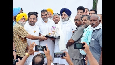 Shiromani Akali Dal president Sukhbir Singh Badal with other party leaders on Sunday. Shiromani Akali Dal president Sukhbir Singh Badal with other party leaders on Sunday.