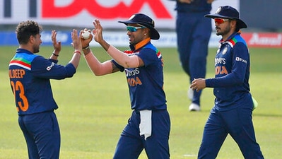 Kuldeep Yadav and Shikhar Dhawan celebrate the dismissal of Sri Lanka's Bhanuka Rajapaksa during the first ODI (AP)