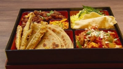 Tiffin box: Dipender prepared this dish in the 90 minutes Bento-Box challenge where contestants had to recreate the traditional Japanese packed meal. In her version, she added chole curry, kadhai paneer, gobi parathas, crunchy fried bhindi, flavoured rice and her grandmother’s vegetable pickle.  (Instagram/@depinder_)