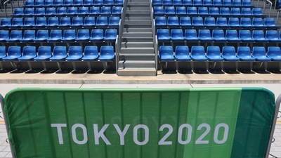 Tokyo 2020 Olympics - Rowing Training Sessions - Sea Forest Waterway, Tokyo, Japan - July 18, 2021 General view of seats and Tokyo 2020 Olympics signage REUTERS/Thomas Peter (REUTERS)