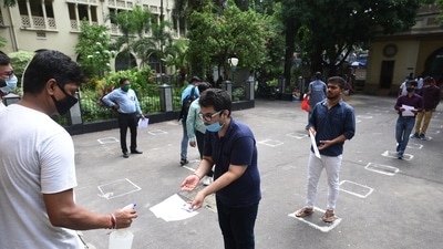Students are being thermal screened before entering an examination center to appear for the state Joint Entrance Examination (JEE) at Maulana Azad College in Kolkata, West Bengal, India, on Saturday, July 17, 2021. (Samir Jana/HT Photo) Students are being thermal screened before entering an examination center to appear for the state Joint Entrance Examination (JEE) at Maulana Azad College in Kolkata, West Bengal, India, on Saturday, July 17, 2021. (Samir Jana/HT Photo)