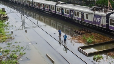 Waterlogging on a railway track due to heavy rain at Matunga area, in Mumbai on July 18. The BMC has also asked citizens to boil water before drinking as heavy rains over the last two days have led to flooding in the water purification complex at Bhandup. (PTI) Waterlogging on a railway track due to heavy rain at Matunga area, in Mumbai on July 18. The BMC has also asked citizens to boil water before drinking as heavy rains over the last two days have led to flooding in the water purification complex at Bhandup. (PTI)