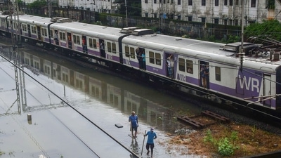Waterlogging on a railway track due to heavy rain at Matunga area, in Mumbai on July 18. The BMC has also asked citizens to boil water before drinking as heavy rains over the last two days have led to flooding in the water purification complex at Bhandup (PTI).