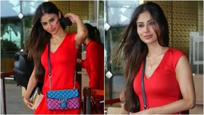Mouni Roy truly knows how to balance the best of both worlds when it comes to her sartorial choices, be it classic kurta sets or breezy dresses. For her flight out of Mumbai today, the actor picked an effortless look, and we love it. (Varinder Chawla) Mouni Roy truly knows how to balance the best of both worlds when it comes to her sartorial choices, be it classic kurta sets or breezy dresses. For her flight out of Mumbai today, the actor picked an effortless look, and we love it. (Varinder Chawla)
