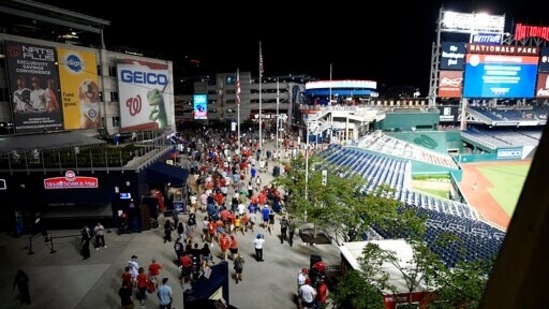 Spectators leave the stadium in the sixth inning of a baseball game between the Washington Nationals and the San Diego Padres, on Saturday, July 17, 2021, in Washington. (AP)