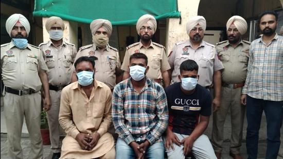The accused in police custody of Doraha in Ludhiana on Sunday. (HT PHOTO)