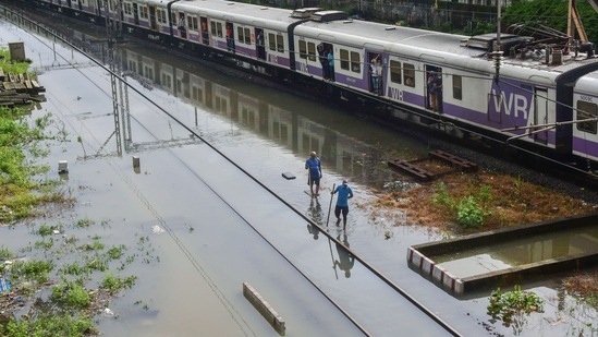 Waterlogging on a railway track due to heavy rain at Matunga area, in Mumbai on July 18. The BMC has also asked citizens to boil water before drinking as heavy rains over the last two days have led to flooding in the water purification complex at Bhandup.(PTI)