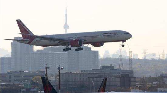 Air India flight 187 from New Delhi lands at Pearson Airport in Toronto on April 23, 2021. (AP)