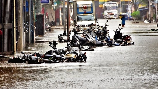A waterlogged street amid heavy rain at the Lalbaug area in Mumbai on Sunday. (Praful Gangurde /HT) A waterlogged street amid heavy rain at the Lalbaug area in Mumbai on Sunday. (Praful Gangurde /HT)